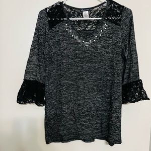 Grayish top with netted cloth at neck and sleeves